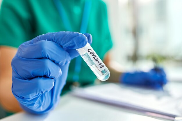 Closeup of epidemiologist working on coronavirus research in a laboratory