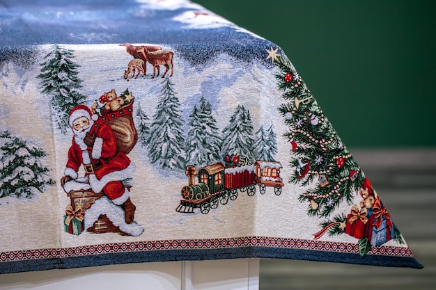 Free photo closeup of a festive christmas tablecloth for the table