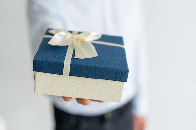 Closeup of gift on male hand