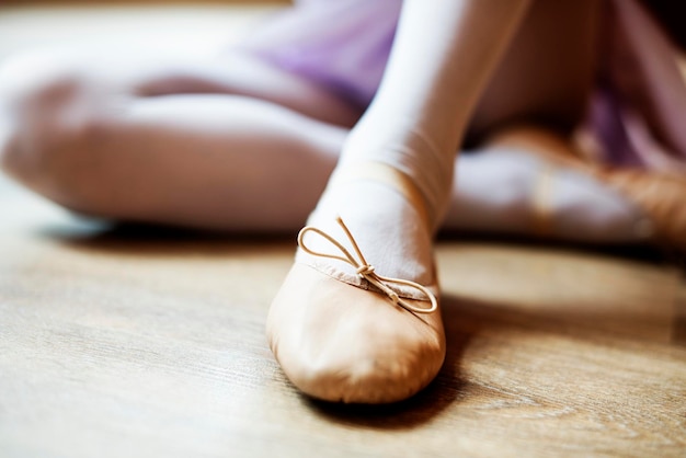 A closeup of a girl&amp;#39;s ballet shoe