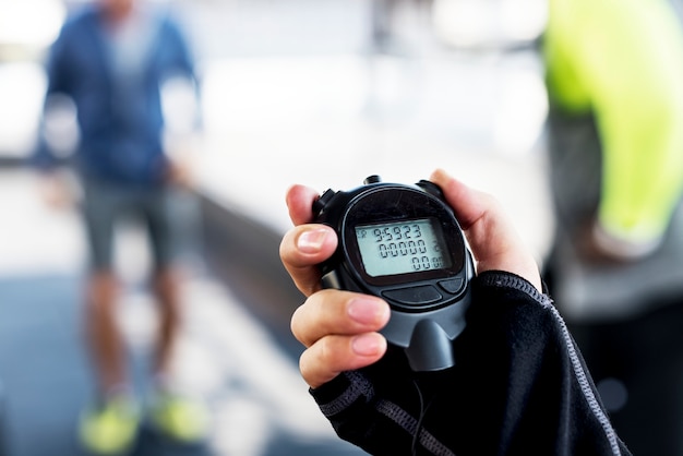 Free photo closeup of hand holding stopwatch