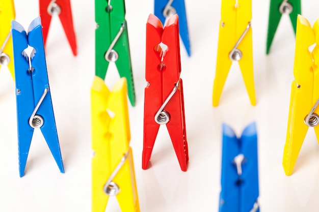 Free Photo  Closeup image of colorful office clothespins