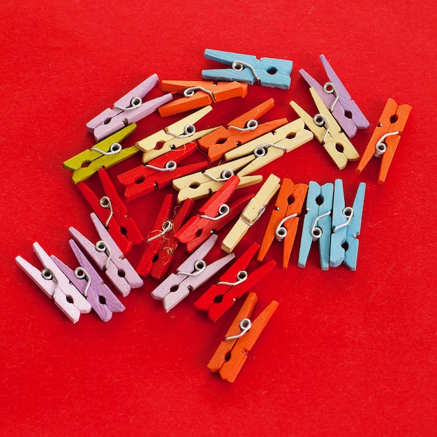 Closeup image of colorful office clothespins 