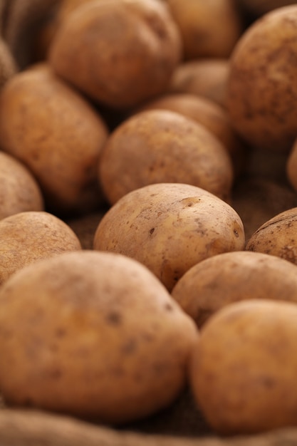 Closeup image of a rustic unpeeled potatoes 