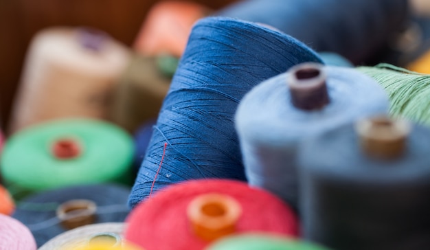 Closeup image of various colour threads