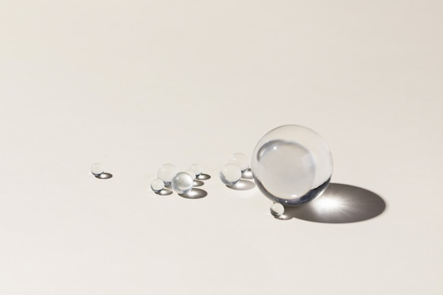 Closeup of little glass balls on a white background