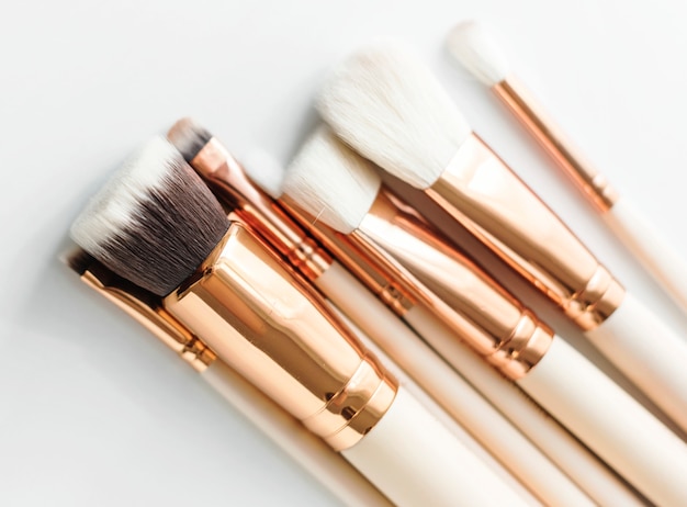 Free photo closeup of makeup brushes on white background