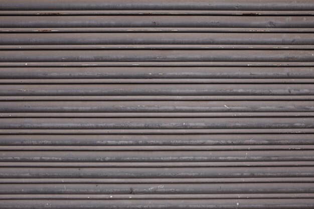 Closeup of a metal gate typically found on buildings