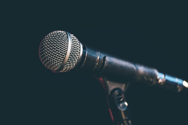 Closeup of a microphone in the dark