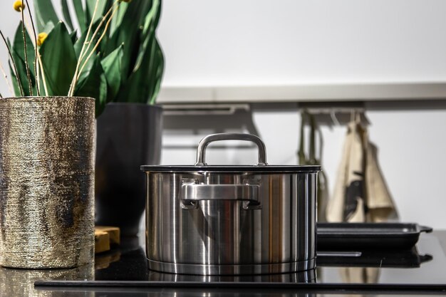 Closeup modern steel pan in the interior of the kitchen