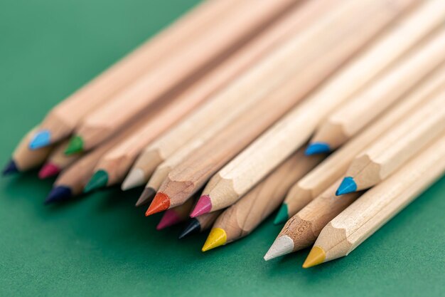 Closeup multicolored wooden pencils for drawing isolated