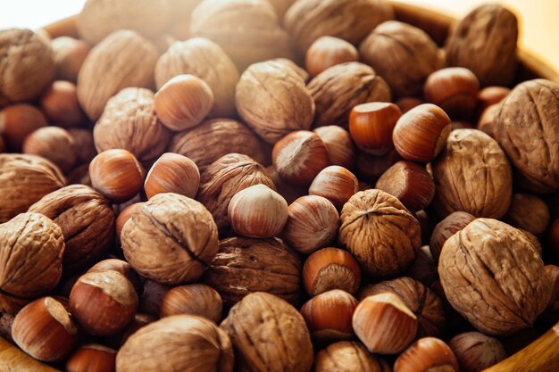 Closeup of nuts on a wooden plate