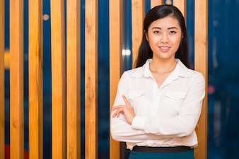 http://img.freepik.com/free-photo/closeup-of-elegant-asian-lady-at-wooden-partition_1262-2360.jpg?size=338&ext=jpg