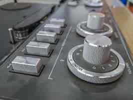 Free photo closeup of an old dusty cdj on the table with a blurred background