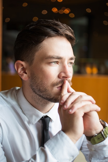 Free photo closeup of pensive attractive business man