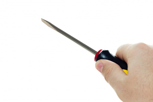 Closeup of a person holding a screwdriver