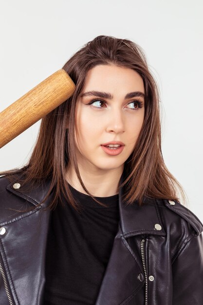 Closeup photo of young beautiful lady standing on white background