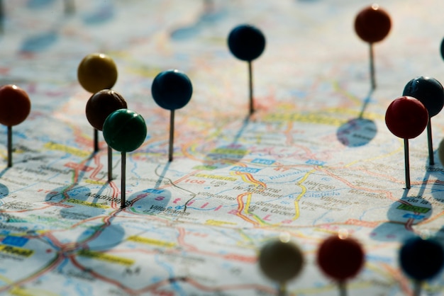 Closeup of pins on the map planning travel journey