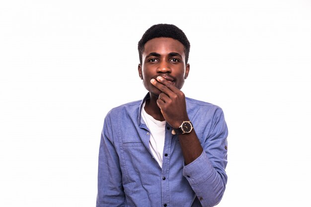 Closeup portrait petrified young handsome man looking shocked surprised in disbelief, hands covering mouth, big eyes, isolated white wall. Positive human emotion facial expression feeling