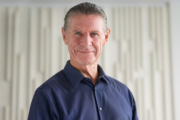 Closeup Portrait of Smiling Friendly Senior Man