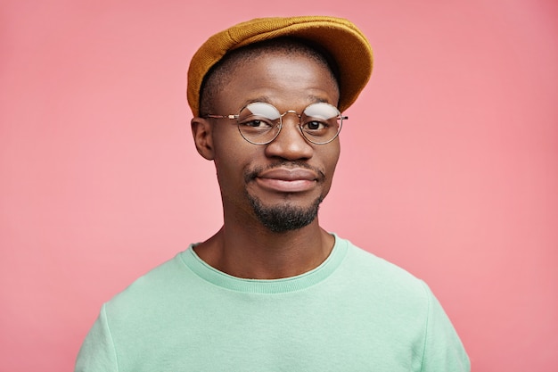 Closeup portrait of young African-American man with hat