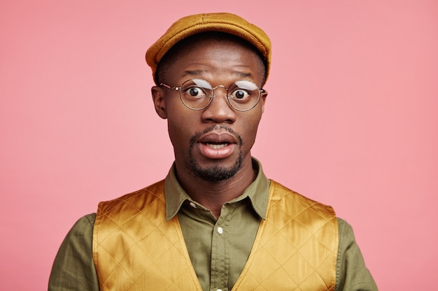 Closeup portrait of young african-american man with hat