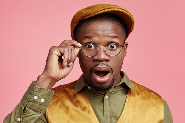 Closeup portrait of young African-American man with hat