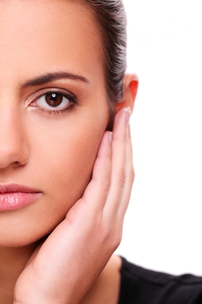 Closeup portrait of young woman face