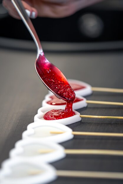 Closeup the process of making lollipops from natural ingredients