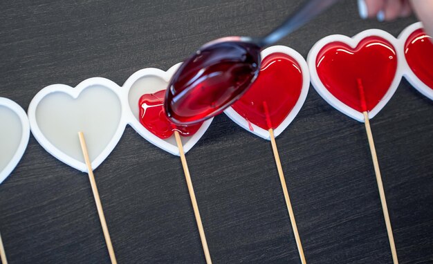 Closeup the process of making lollipops from natural ingredients