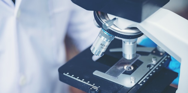 Closeup of scientific microscope data analysis in the laboratory