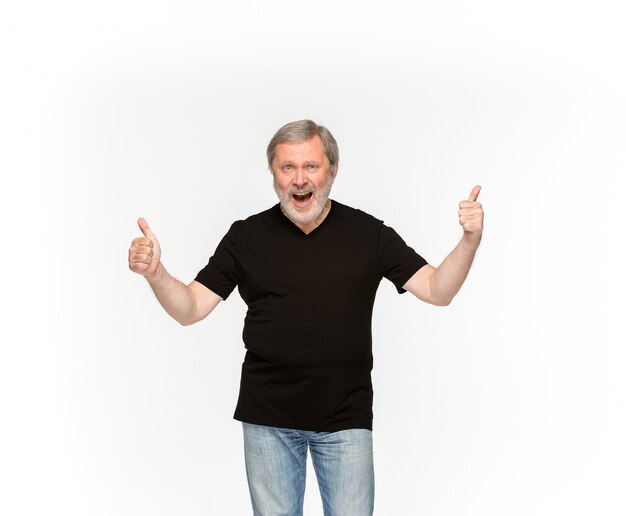 Closeup of senior man's body in empty black t-shirt isolated on white