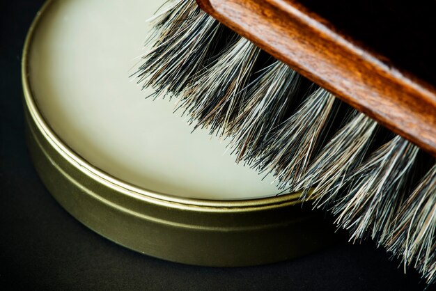 Free photo closeup of shoe brush and polish