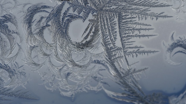 Closeup shot of beautiful frost patterns and textures on glass