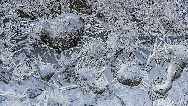 Closeup shot of beautiful frost patterns and textures on a glass