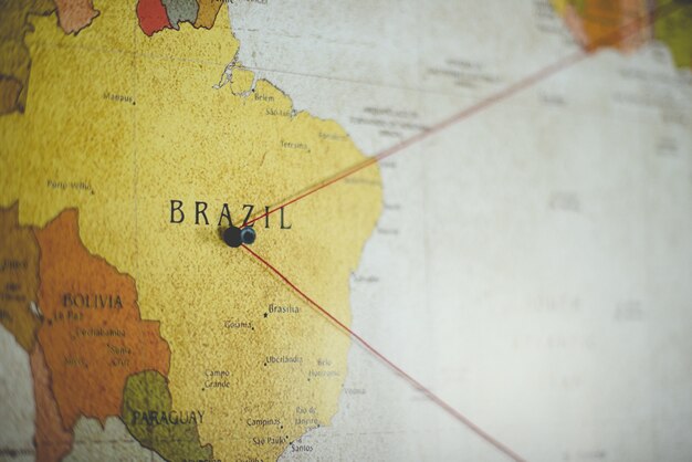 Closeup shot of a black pin on the Brazil country on the map