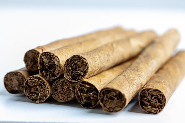 Closeup shot of brown cigars one on another