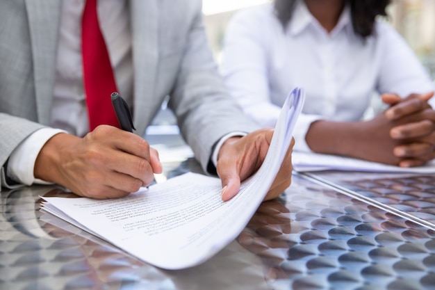 Closeup shot of businessman signing documents