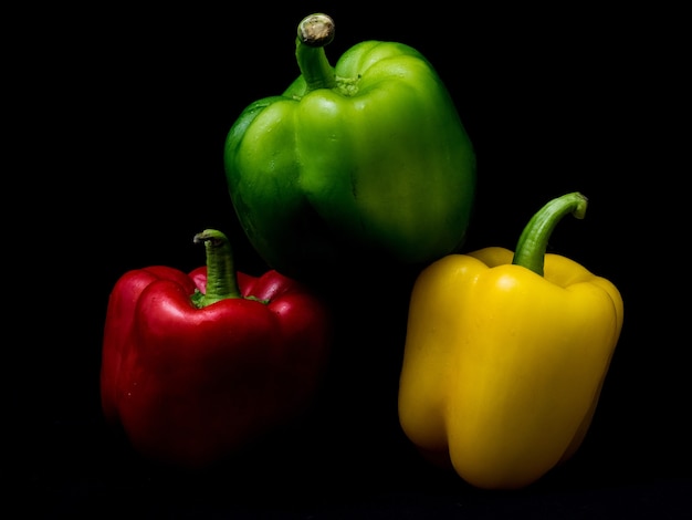 Closeup shot of colorful peppers isolated