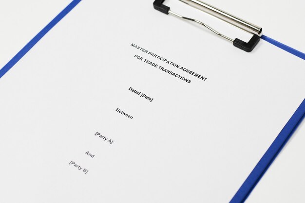 Closeup shot of a contract attached to a blue folder