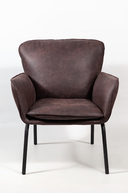 Free photo closeup shot of a dark brown leather armchair