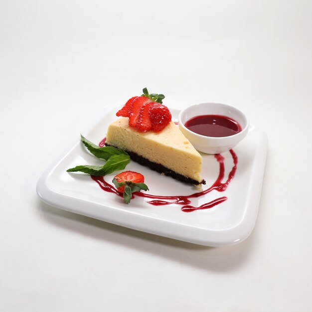 Closeup shot of delicious cheesecake with strawberries