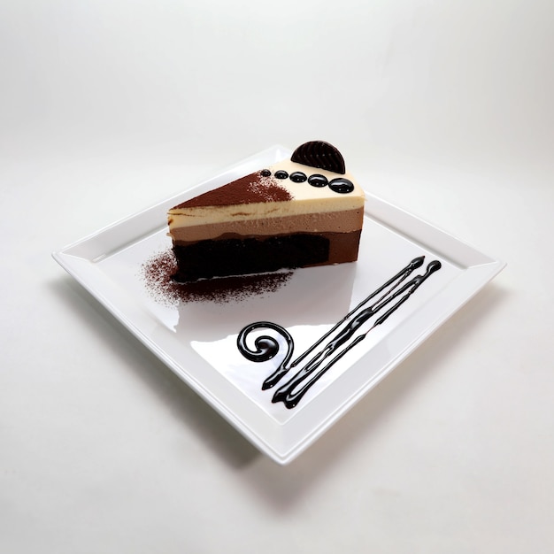 Closeup shot of delicious creamy chocolate cheesecake in a plate