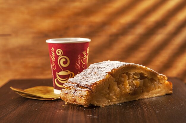 Closeup shot of delicious homemade Colombian cookies with a cup of dark coffee on the table