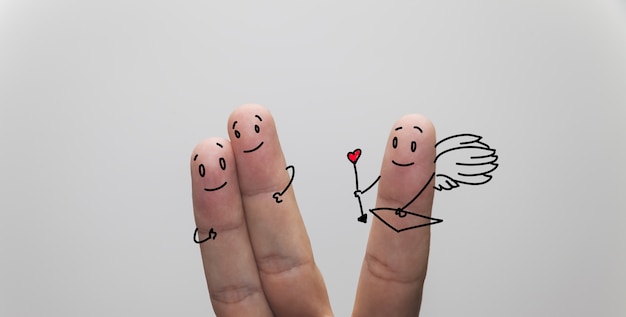 Free photo closeup shot of finger couple in love, with cupid finger aside