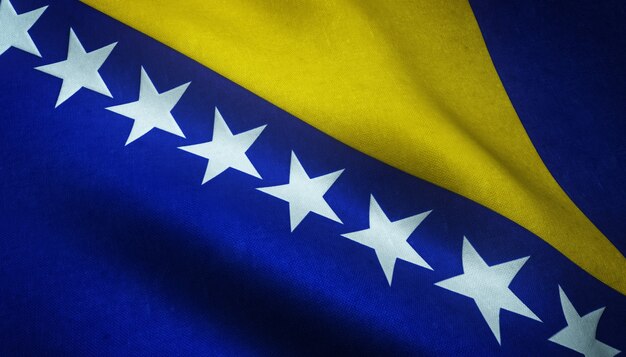 Closeup shot of the flag of Bosnia and Herzegovina with grungy textures