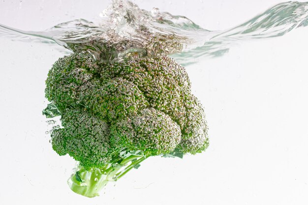 Closeup shot of fresh broccoli in the water