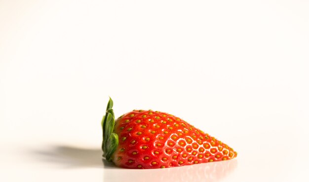 Closeup shot of fresh strawberry isolated