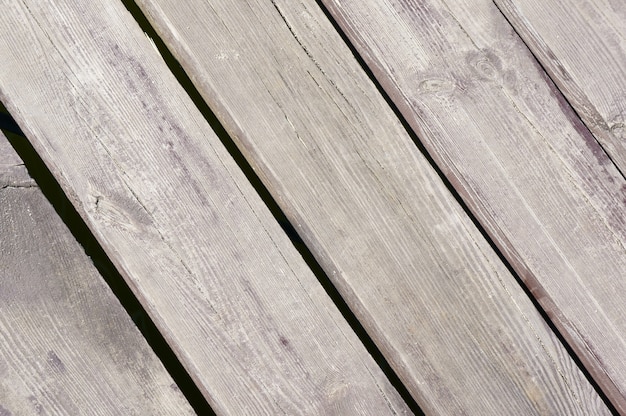 Free photo closeup shot of the grey wooden surface