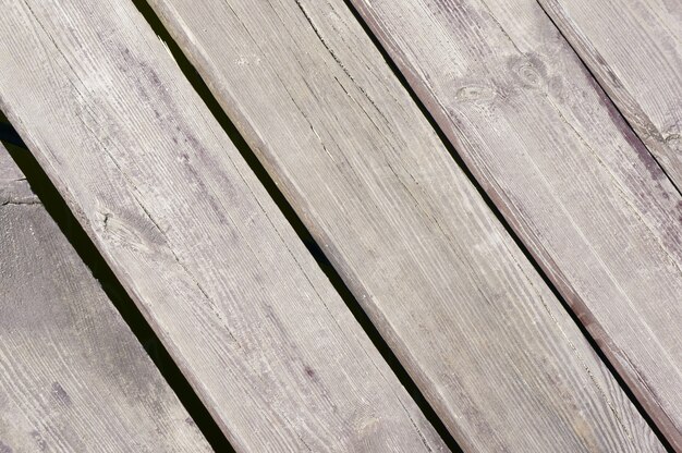 Closeup shot of the grey wooden surface